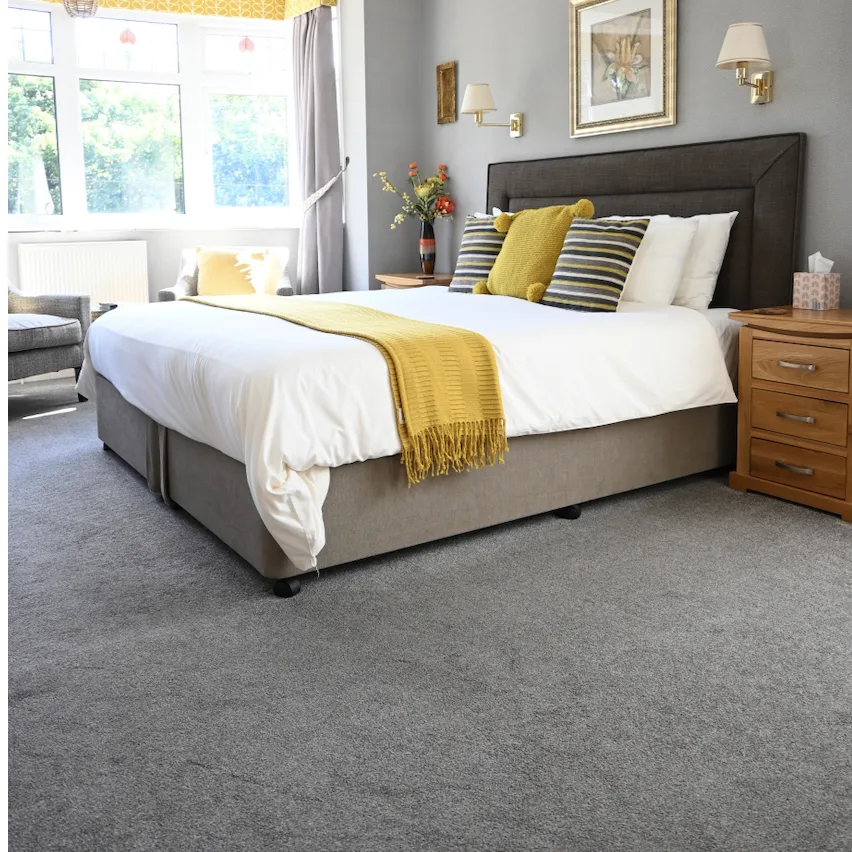 Bright premium double room at Seaside Hideaway Hotel in Scarborough with large bed and bay window